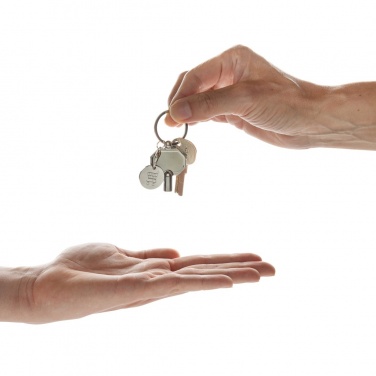 Logotrade meene foto: RCS taaskasutatud tsingisulamist radiaatori võtmehoidja mündiga